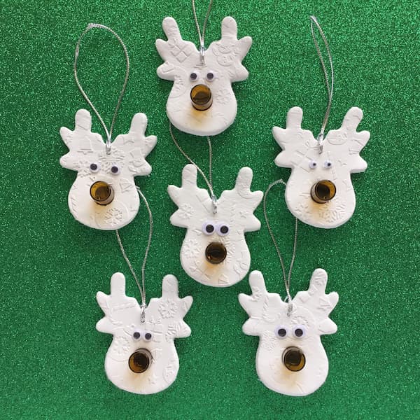 white reindeer clay ornaments with amber noses