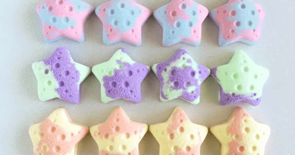 starfish bath bombs in three different colours and scents
