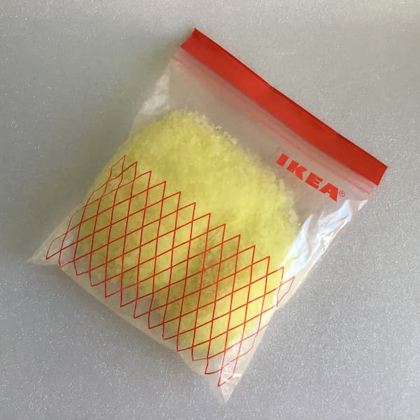 colored and scented epsom salts in a zip lock bag