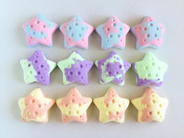 starfish bath bombs in three different colours and scents