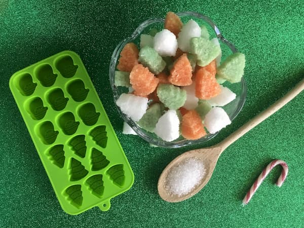 xmas tree epsom salt gems with mould and wooden spoon