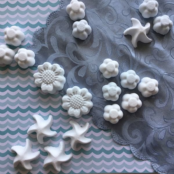 blue starfish, sunflower, and blossom bath bombs