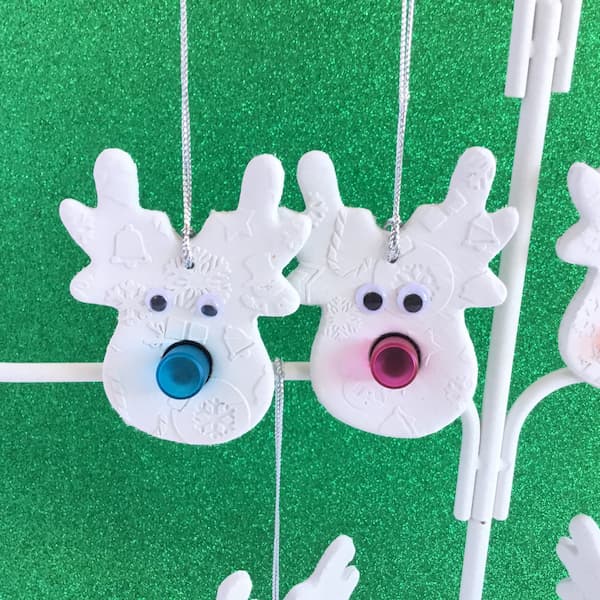 reindeer ornaments with pink and blue noses
