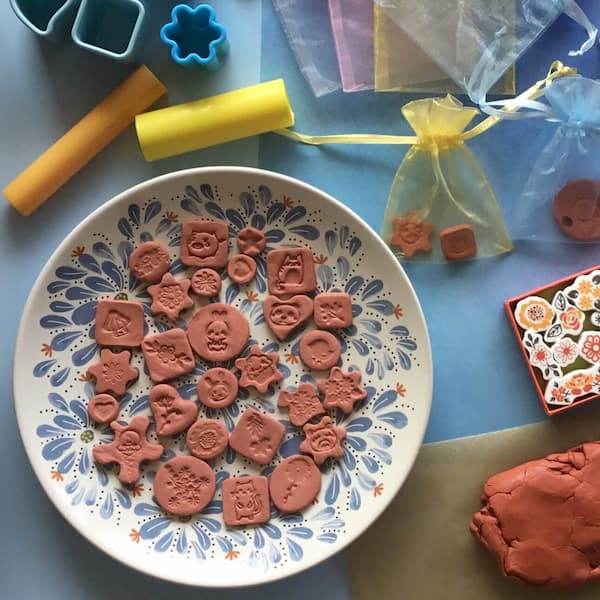 terracotta charms on a plate