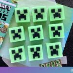 nine minecraft creeper melt and pour soap bars laid out in a grid fashion