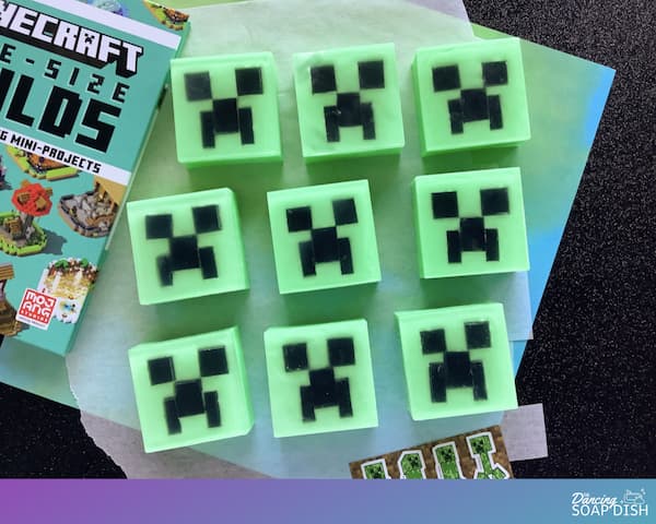 nine minecraft creeper melt and pour soap bars laid out in a grid fashion