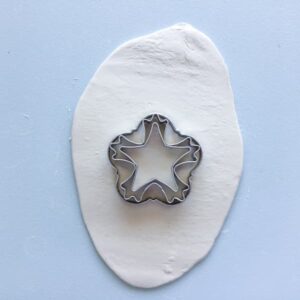 pastry cutters on a white piece of clay