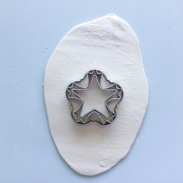 pastry cutters on a white piece of clay