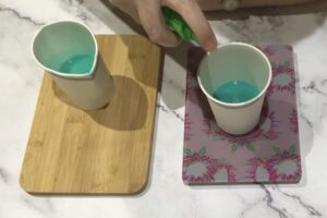 spraying green melt and pour soap with rubbing alcohol