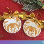 gold stamped clay ornaments with gold bows