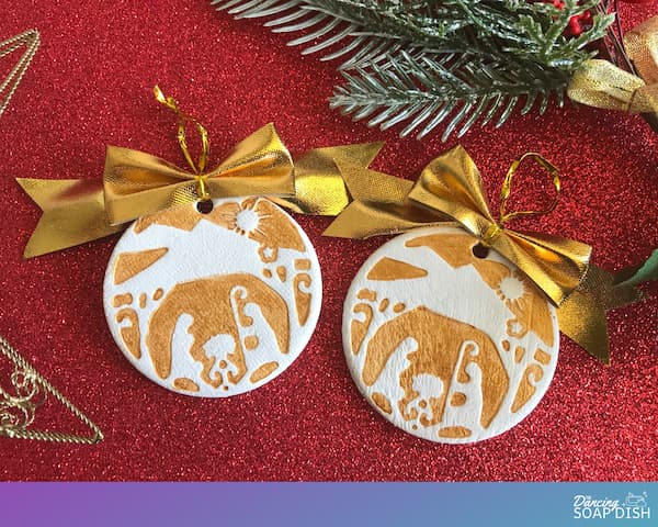 gold stamped clay ornaments with gold bows