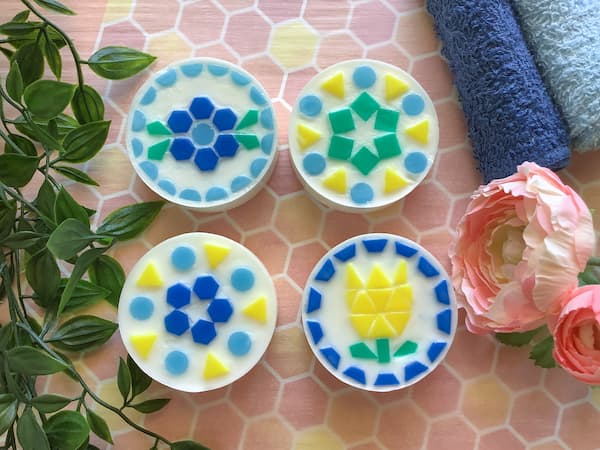 mosaic soap bars with two floral and two geometric designs