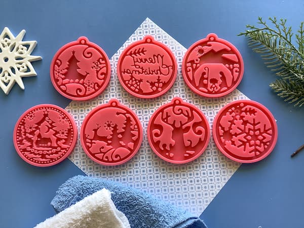seven flat Christmas ornament silicone moulds