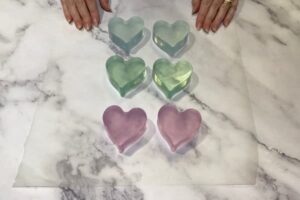 blue, purple and green ultra clear heart-shaped soap bars