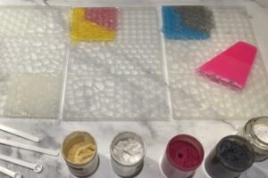 a mosaic silicone mould filled with coloured melt and pour soap