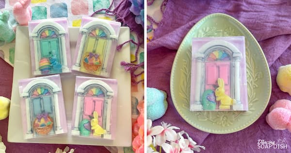 Several arched entry door shaped soaps, each with a different pastel-coloured door and decorated with Easter details such as tiny bunnies and baskets of eggs, are arranged on a white plate. Another soap with a pink door and yellow bunny sits on a green Easter patterned dish. Soft pastel fabrics, artificial flowers, and colourful Easter decorations create a bright, springtime setting.