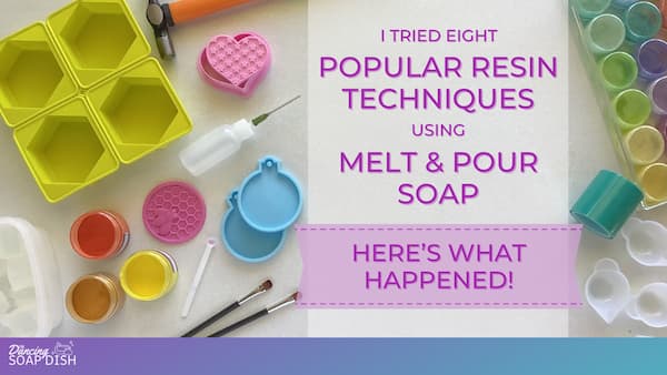 A title graphic for a soap‑making tutorial reads, “I Tried Eight Popular Resin Techniques Using Melt & Pour Soap: Here’s What Happened!” in purple text on a white background. Surrounding the text are colourful craft supplies including moulds in hexagon, heart, and ornament shapes, small containers of pigment, paintbrushes, a squeeze bottle, measuring spoons, and a tray holding small platic cannisters filled with different coloured mica powders.